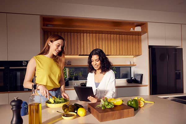 Friends cooking together.
