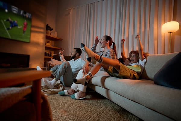 Family watching sports game.