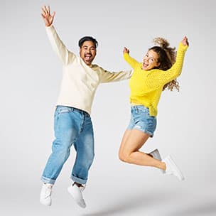 Happy people jumping.