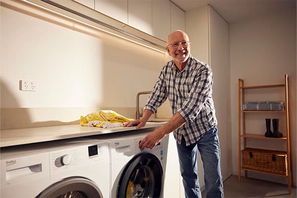 Man doing laundry.