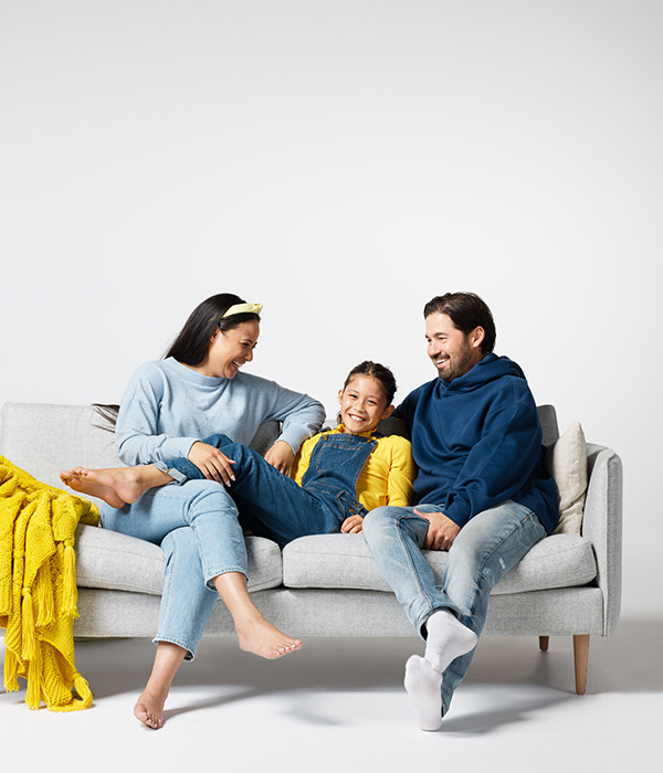 Family on couch mobile banner 600x700