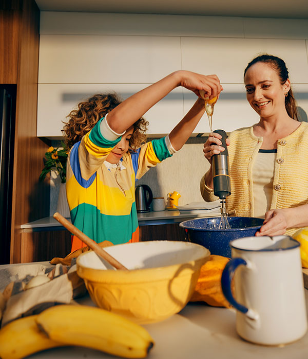 Family cooking breakfest together.