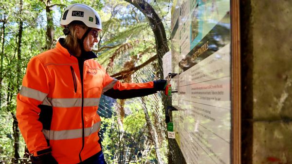 Karin Bell updating site hazard board at Arapuni