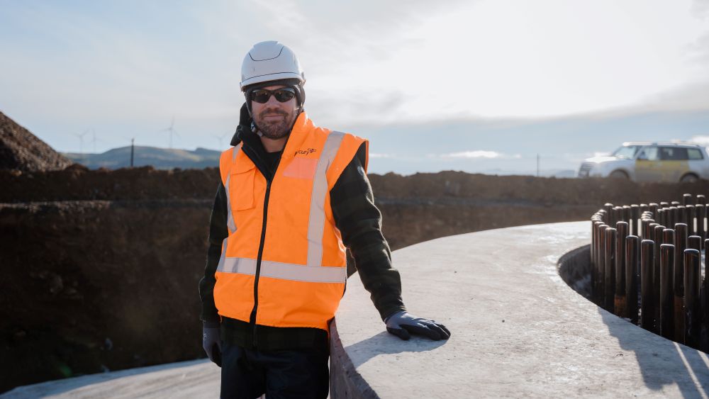 Steward Reid in PPE on construction site of Kaiwera Downs explansion