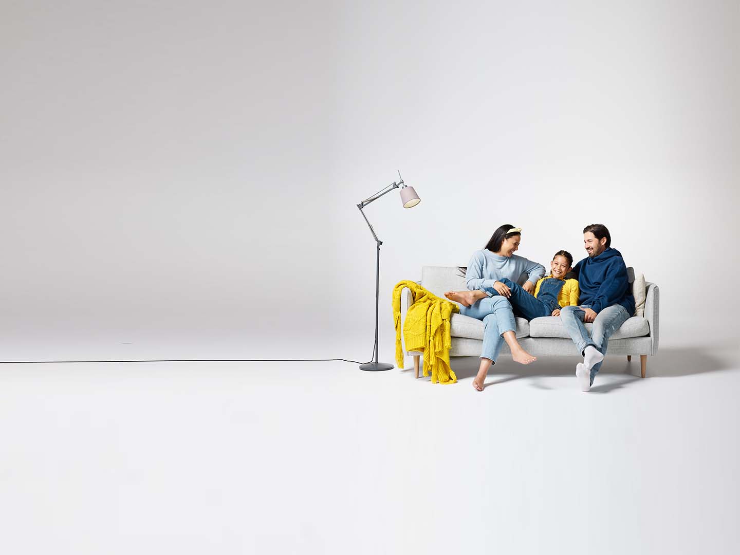 Studio life at home man woman child relaxing lo res 1440x1080