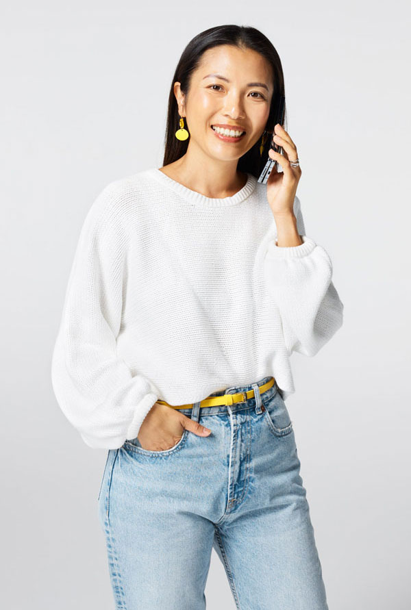 Studio life woman on phone lo res 600x1080