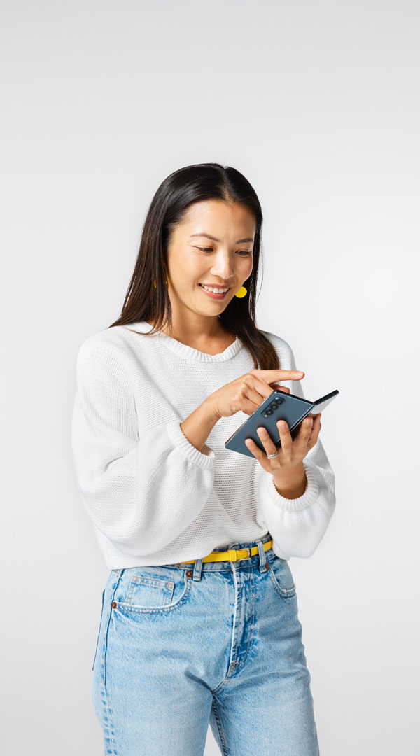 Studio life woman with phone lo res 600x1080